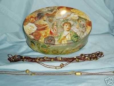 'Victorian decoupaged', m-c, elliptical Biscuit or Sweets Tin