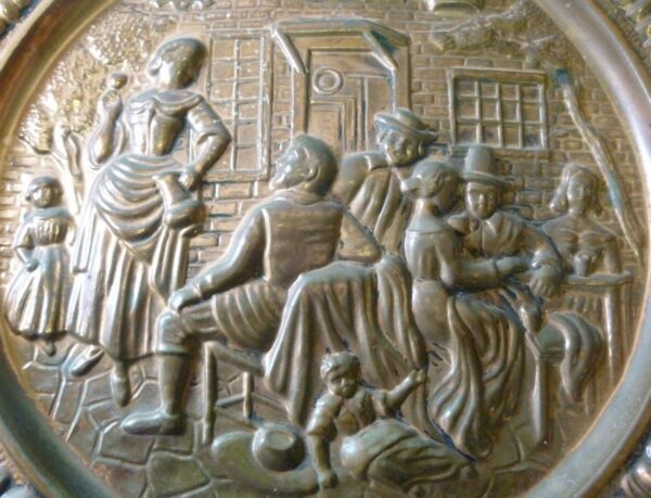 Wall Plaque, early English scene, in embossed copper