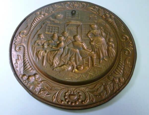 Wall Plaque, early English scene, in embossed copper