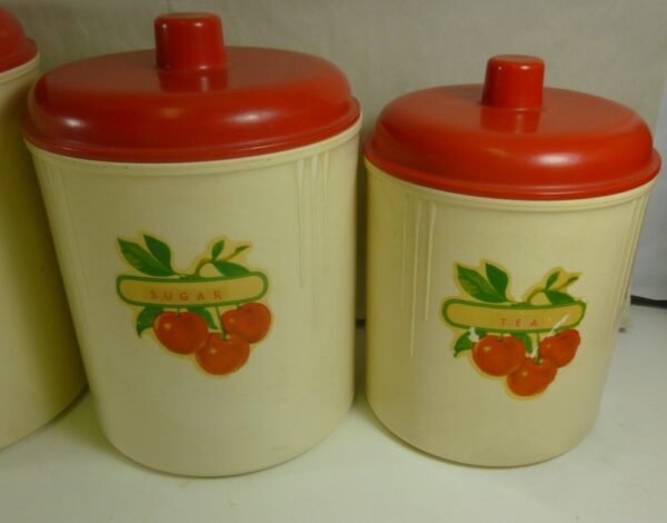 Eon Kitchen Canister Set of 5, script-text labels, in red on cream bakelite, c.1940's