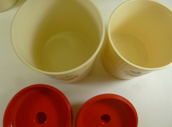 Eon Kitchen Canister Set of 5, script-text labels, in red on cream bakelite, c.1940's