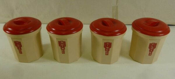 IPLEX Spice Canister Set of 4, in red on cream bakelite, c.1940's