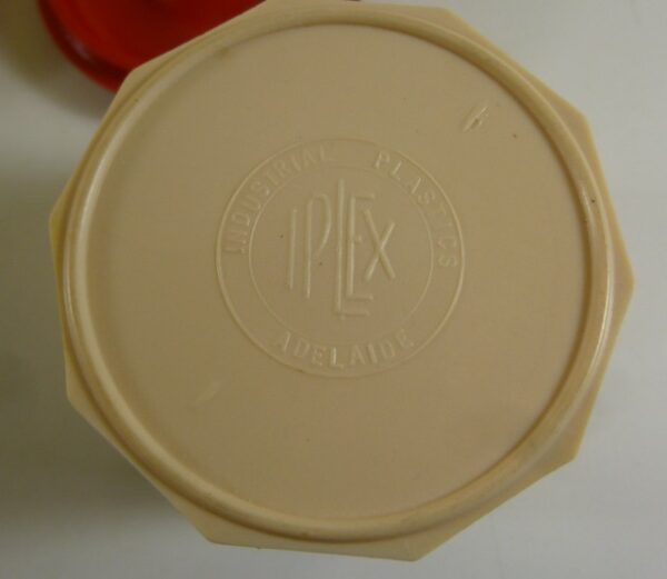 IPLEX Spice Canister Set of 4, in red on cream bakelite, c.1940's