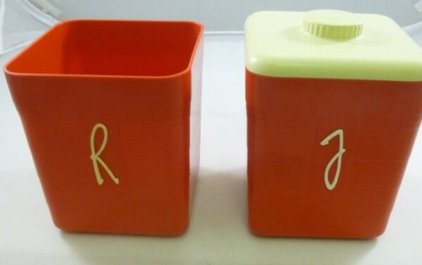 DUPERITE Kitchen 'F' or 'R' Canister, part of Harlequin set, in red bakelite