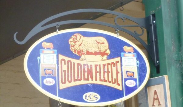 'GOLDEN FLEECE', double-sided, 61 cm long, elliptical hanging Advertising Sign, in tin